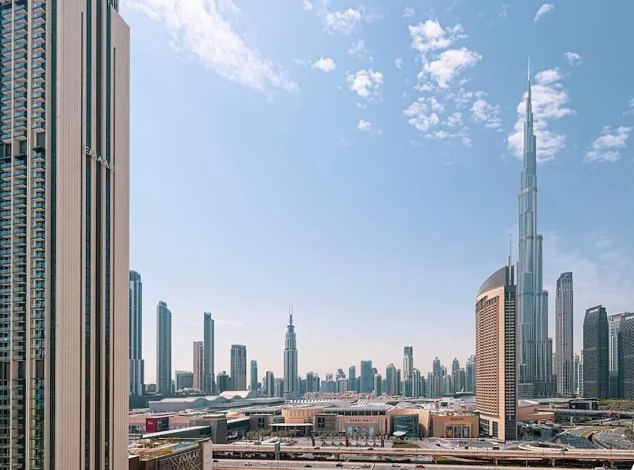 Maxstays - Stunning Burj Khalifa View - Dubai Mall Access - Infinity Pool Apartment